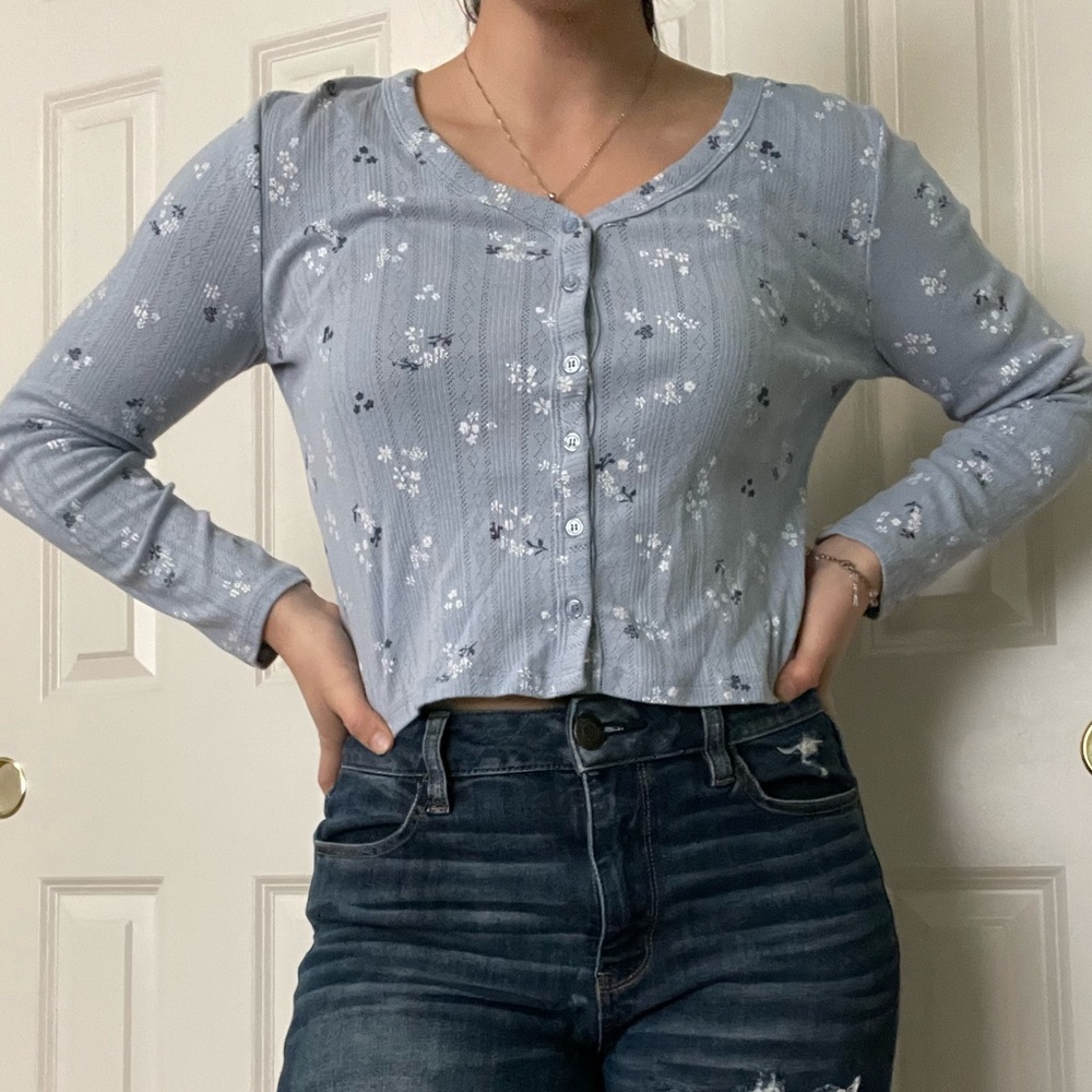 Cropped long sleeve shirt with little white flowers! Worn only a few times